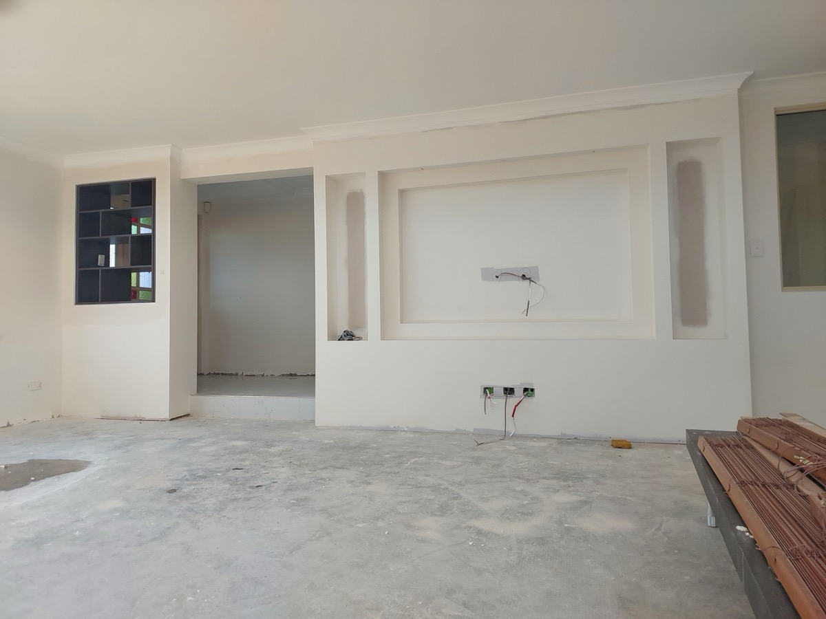Plasterboard feature wall with TV recess and display niches, skim coated and ready for paint, Perth